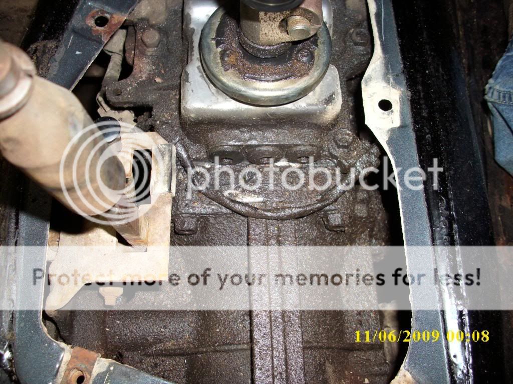 check out the images on this page of my build, it will show you the space between the trans and t case and the gasket i made as well as the freeze ...